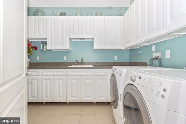 4083 Reels Mill Rd, Frederick, MD 21704 - clothes washing area featuring cabinet space, independent washer and dryer, and light tile patterned floors
