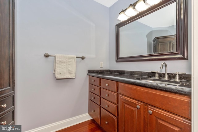 4083 Reels Mill Rd, Frederick, MD 21704 - bathroom featuring wood finished floors, vanity, and baseboards