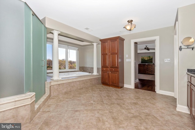 4083 Reels Mill Rd, Frederick, MD 21704 - full bathroom featuring decorative columns, a bath, tile patterned flooring, vanity, and a ceiling fan