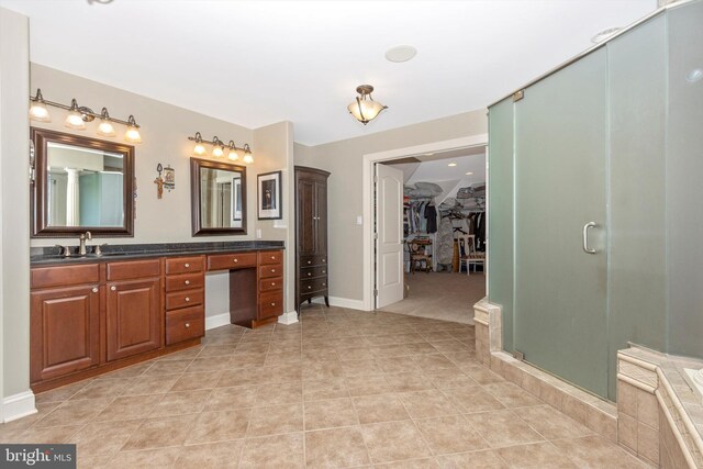 4083 Reels Mill Rd, Frederick, MD 21704 - full bath with a shower stall, vanity, tile patterned floors, and a walk in closet