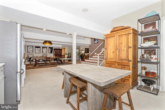 4083 Reels Mill Rd, Frederick, MD 21704 - dining room with stairs and light tile patterned floors
