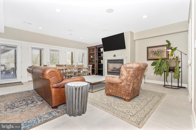 4083 Reels Mill Rd, Frederick, MD 21704 - living area with a glass covered fireplace, light tile patterned flooring, recessed lighting, and baseboards