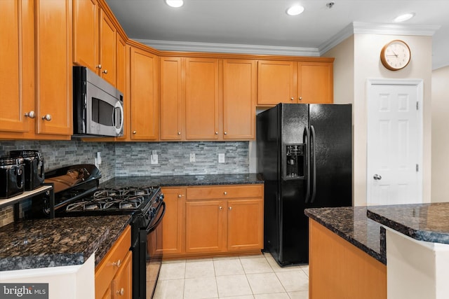 kitchen with decorative backsplash, light tile patterned floors, ornamental molding, and black appliances