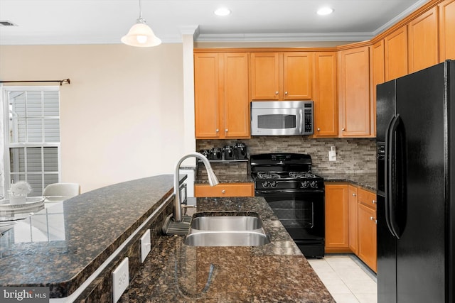 kitchen featuring black appliances, decorative backsplash, ornamental molding, and a sink