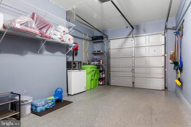 garage featuring refrigerator