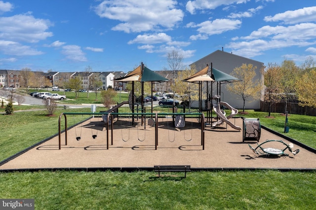 community playground featuring a yard