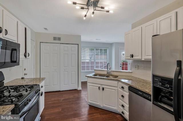 11620 Myrtle Oak Ct, Waldorf, MD 20601 - kitchen featuring appliances with stainless steel finishes, a sink, decorative backsplash, and white cabinets