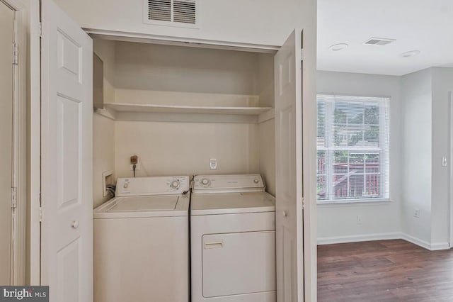 11620 Myrtle Oak Ct, Waldorf, MD 20601 - laundry room featuring wood finished floors, baseboards, and washing machine and clothes dryer