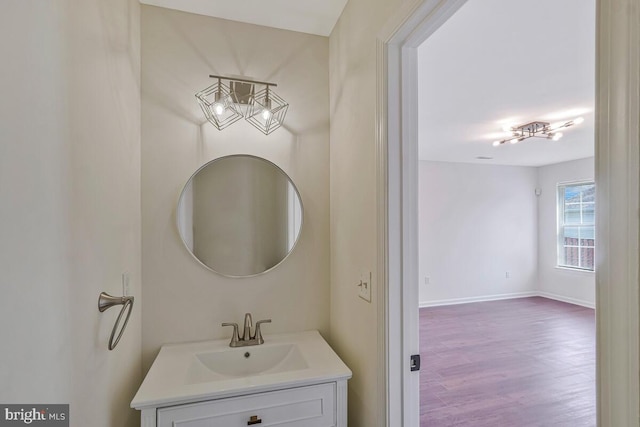 11620 Myrtle Oak Ct, Waldorf, MD 20601 - bathroom featuring vanity, wood finished floors, and baseboards