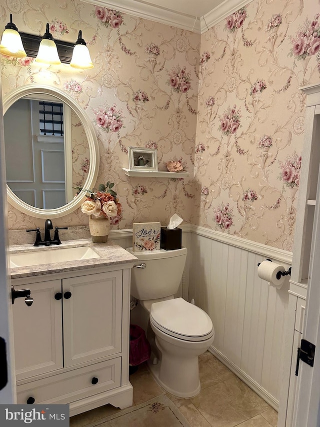 175 Barracuda Rd, Manahawkin, NJ 08050 - half bath featuring wainscoting, vanity, toilet, tile patterned flooring, and ornamental molding