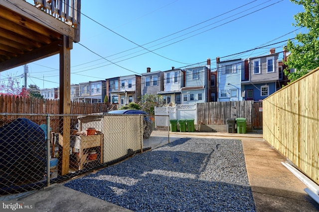 806 W 35th St, Baltimore, MD 21211 - exterior space with fence and a residential view