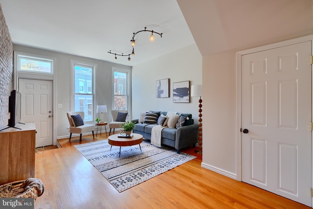 806 W 35th St, Baltimore, MD 21211 - living room with light wood-style flooring and baseboards