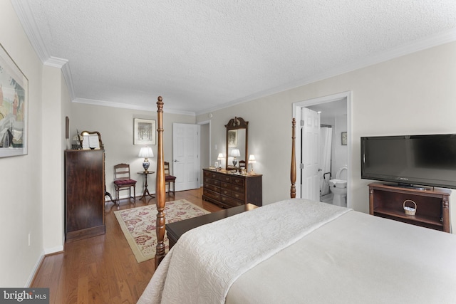 1515 S Arlington Ridge Rd Unit 402, Arlington, VA 22202 - bedroom featuring connected bathroom, a textured ceiling, ornamental molding, and wood finished floors