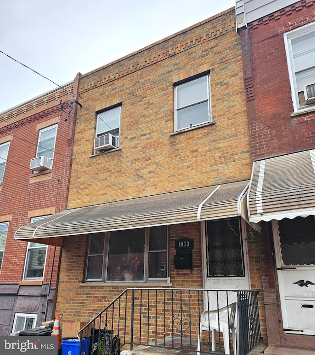 1923 Mifflin St, Philadelphia, PA 19145 - view of front of house featuring cooling unit and brick siding