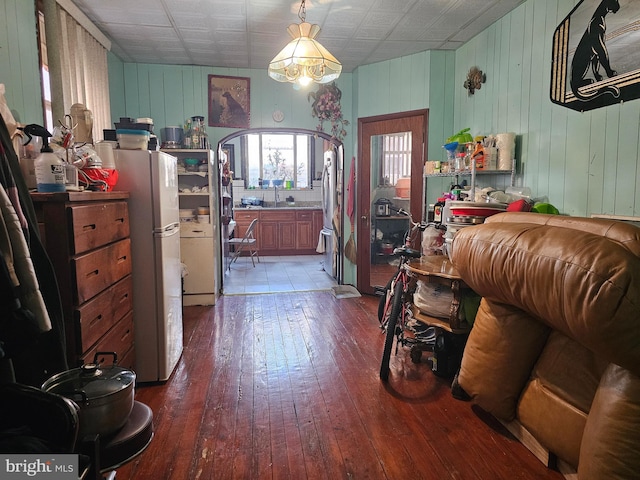 1923 Mifflin St, Philadelphia, PA 19145 - interior space featuring an ornate ceiling, freestanding refrigerator, hardwood / wood-style flooring, and wooden walls
