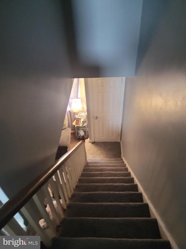 2027 Anchor St, Philadelphia, PA 19124 - staircase featuring carpet floors