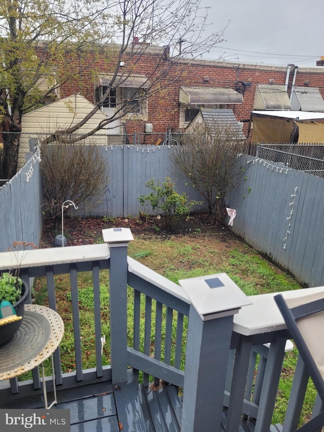 2027 Anchor St, Philadelphia, PA 19124 - wooden deck with a fenced backyard