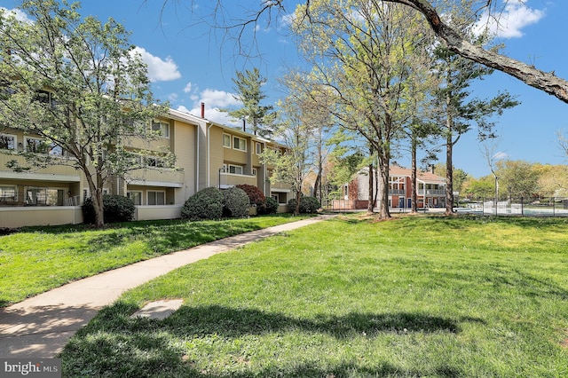 view of community with a lawn