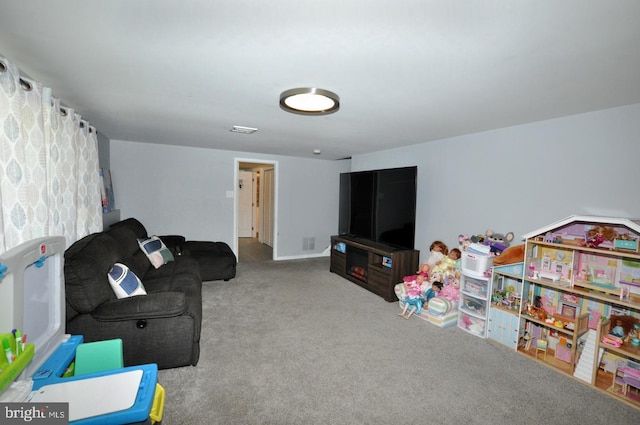 carpeted living room featuring visible vents