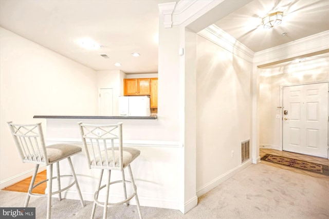 701 Fallsgrove Dr Unit 314, Rockville, MD 20850 - entrance foyer featuring light colored carpet, recessed lighting, and ornamental molding
