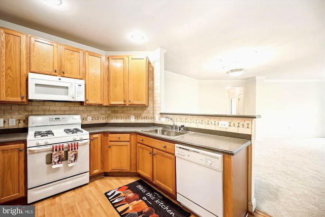 701 Fallsgrove Dr Unit 314, Rockville, MD 20850 - kitchen with white appliances, dark countertops, tasteful backsplash, a peninsula, and ornamental molding