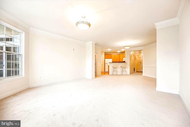 701 Fallsgrove Dr Unit 314, Rockville, MD 20850 - unfurnished living room featuring ornamental molding and light colored carpet