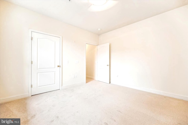 701 Fallsgrove Dr Unit 314, Rockville, MD 20850 - unfurnished bedroom featuring carpet floors and baseboards