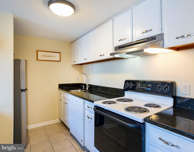 312 Severn Ave Unit W 401, Annapolis, MD 21403 - kitchen featuring range with electric cooktop, under cabinet range hood, white dishwasher, freestanding refrigerator, and white cabinets