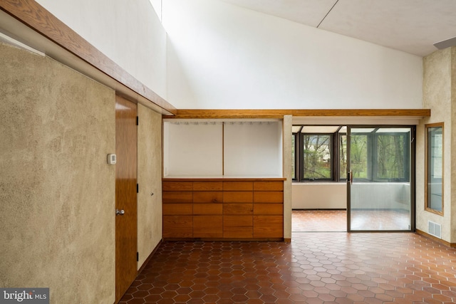 390 S Bryn Mawr Ave, Bryn Mawr, PA 19010 - empty room featuring visible vents and a towering ceiling
