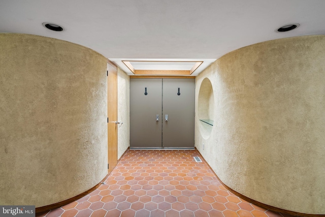 390 S Bryn Mawr Ave, Bryn Mawr, PA 19010 - hall featuring a textured wall and visible vents