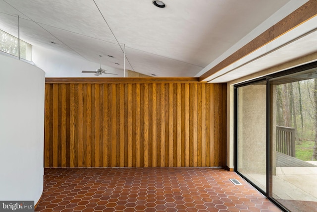 390 S Bryn Mawr Ave, Bryn Mawr, PA 19010 - interior space featuring wooden walls, visible vents, vaulted ceiling, and ceiling fan