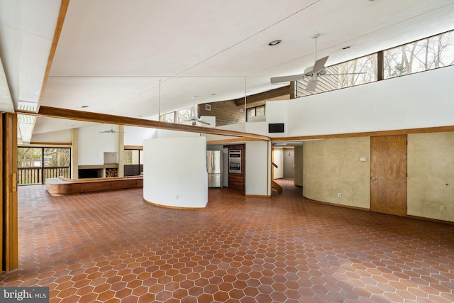 390 S Bryn Mawr Ave, Bryn Mawr, PA 19010 - interior space featuring ceiling fan, high vaulted ceiling, and stone finish floor