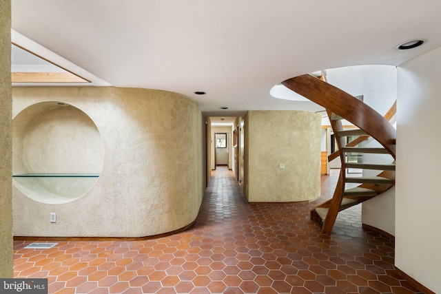390 S Bryn Mawr Ave, Bryn Mawr, PA 19010 - hallway featuring a wealth of natural light and stairway