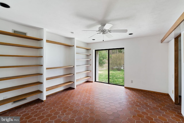 390 S Bryn Mawr Ave, Bryn Mawr, PA 19010 - unfurnished bedroom featuring baseboards and dark tile patterned floors