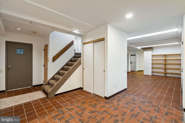 390 S Bryn Mawr Ave, Bryn Mawr, PA 19010 - finished below grade area featuring baseboards, stairway, and recessed lighting