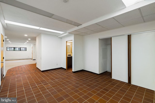 390 S Bryn Mawr Ave, Bryn Mawr, PA 19010 - basement with recessed lighting and a baseboard heating unit
