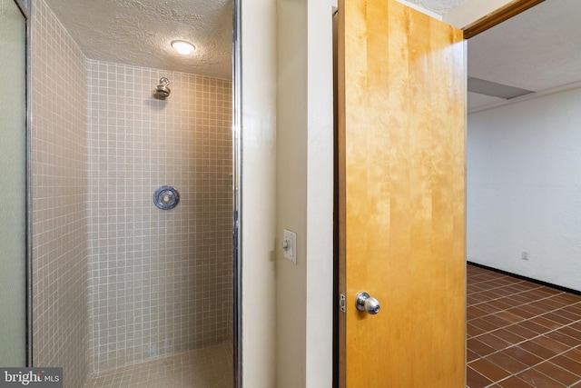 390 S Bryn Mawr Ave, Bryn Mawr, PA 19010 - full bathroom with a textured ceiling and tiled shower