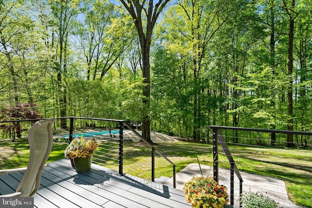 208 Biggs Purchase Ln, Lothian, MD 20711 - deck featuring a lawn