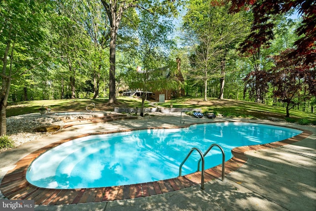 208 Biggs Purchase Ln, Lothian, MD 20711 - outdoor pool with a lawn