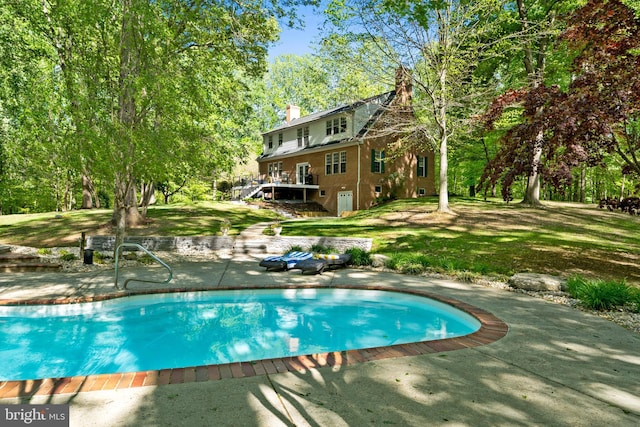 208 Biggs Purchase Ln, Lothian, MD 20711 - pool with a lawn, a deck, and a patio