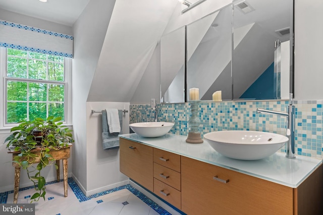 208 Biggs Purchase Ln, Lothian, MD 20711 - bathroom with visible vents, a sink, and decorative backsplash