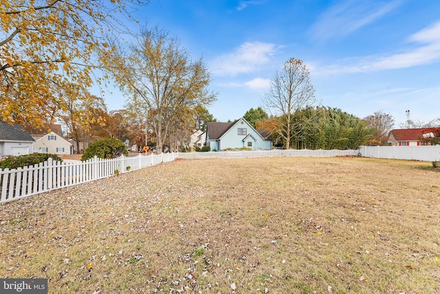 view of yard with fence