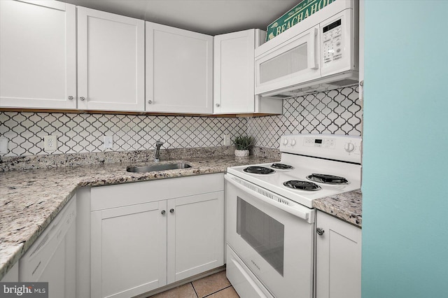 13500 Coastal Hwy Unit 201, Ocean City, MD 21842 - kitchen featuring tasteful backsplash, white cabinetry, a sink, and white appliances