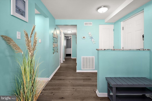 13500 Coastal Hwy Unit 201, Ocean City, MD 21842 - hall featuring wood finished floors, baseboards, and visible vents