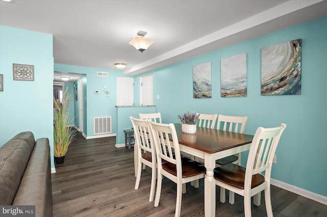 13500 Coastal Hwy Unit 201, Ocean City, MD 21842 - dining space featuring wood finished floors, baseboards, and visible vents