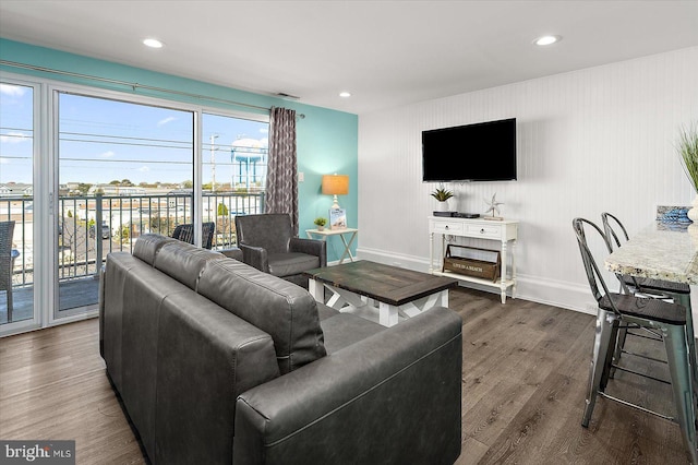 13500 Coastal Hwy Unit 201, Ocean City, MD 21842 - living room with dark wood-type flooring, baseboards, visible vents, and recessed lighting