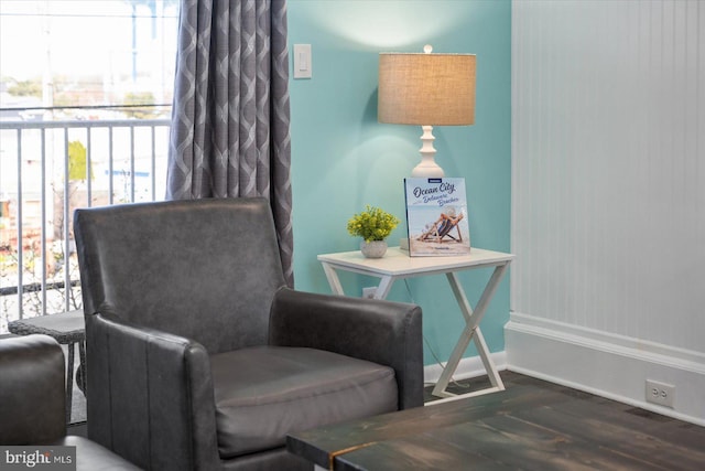 13500 Coastal Hwy Unit 201, Ocean City, MD 21842 - living area featuring wood finished floors and baseboards