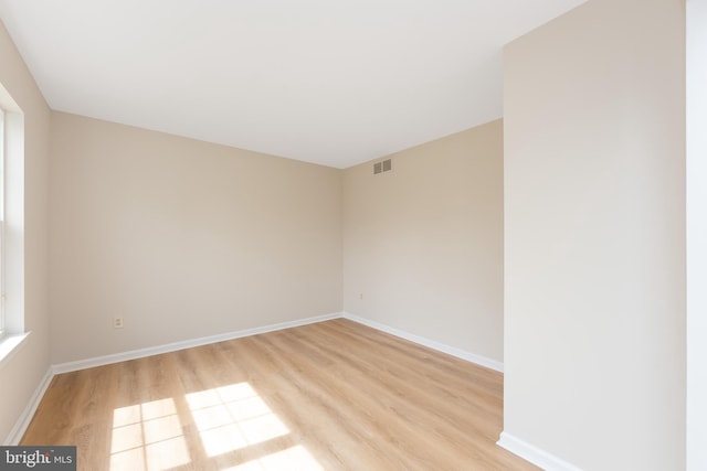 1825 Hessian Dr, Williamstown, NJ 08094 - empty room featuring visible vents, light wood finished floors, and baseboards