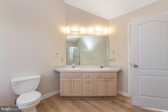 1825 Hessian Dr, Williamstown, NJ 08094 - bathroom with baseboards, vaulted ceiling, wood finished floors, and a sink