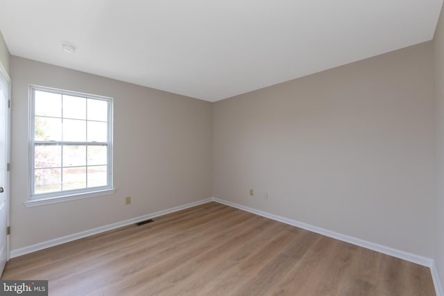 1825 Hessian Dr, Williamstown, NJ 08094 - unfurnished room featuring visible vents, baseboards, and light wood-style floors